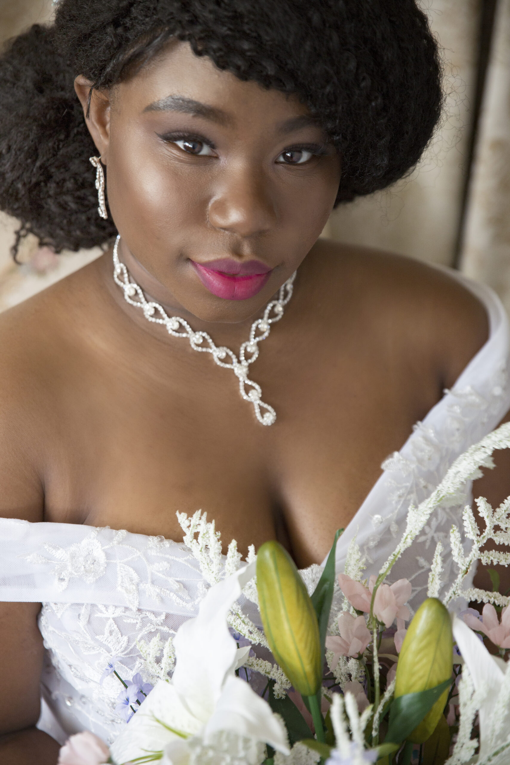 black woman posing for bridal portraits